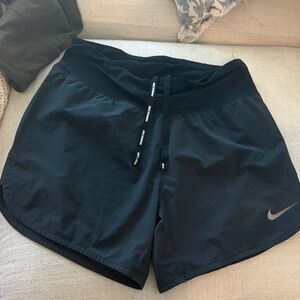 Nike Women's Black Athletic Running Shorts with Reflective Swoosh